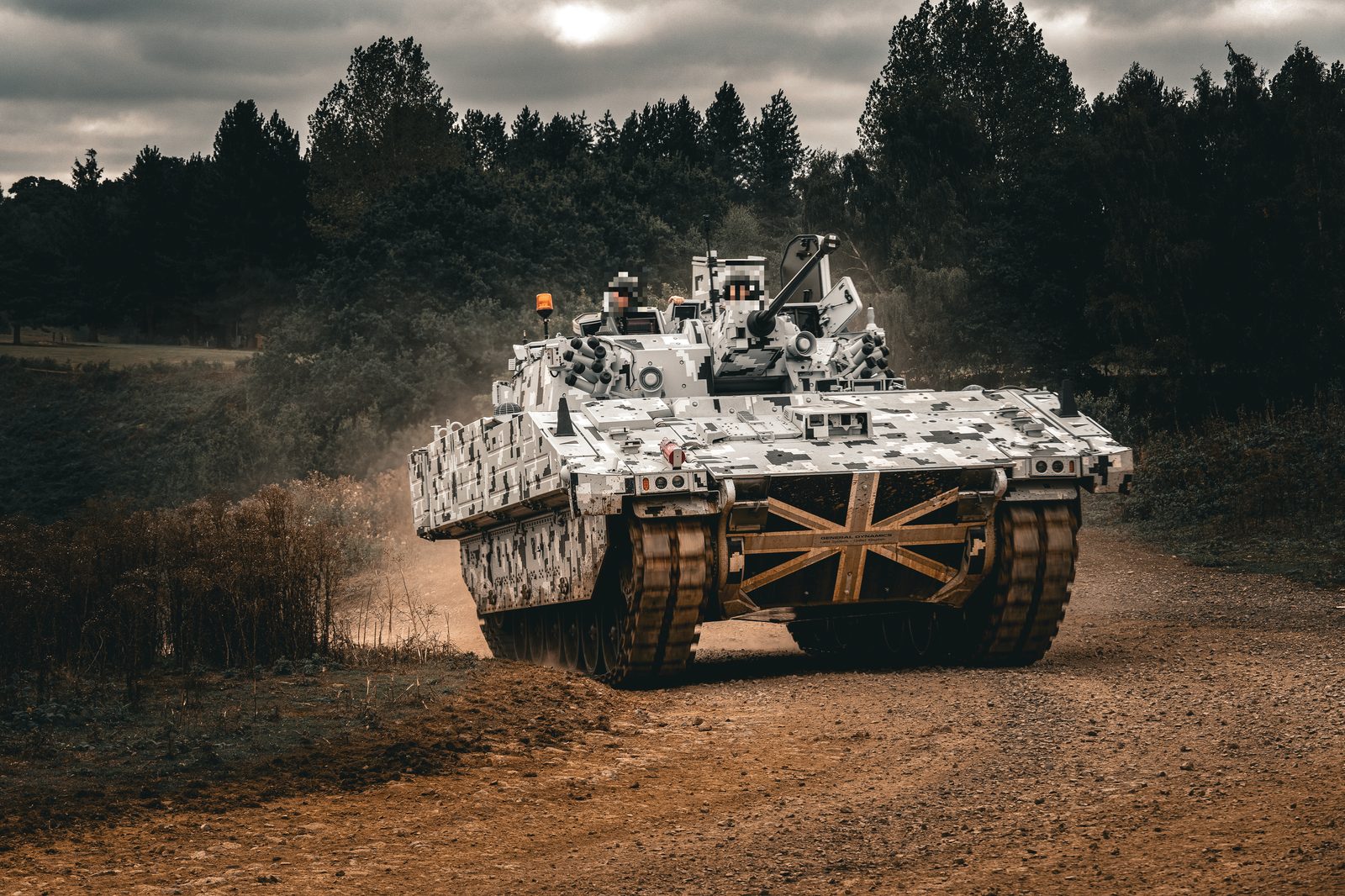 Armoured fighting vehicle in digital camouflage during UK trials