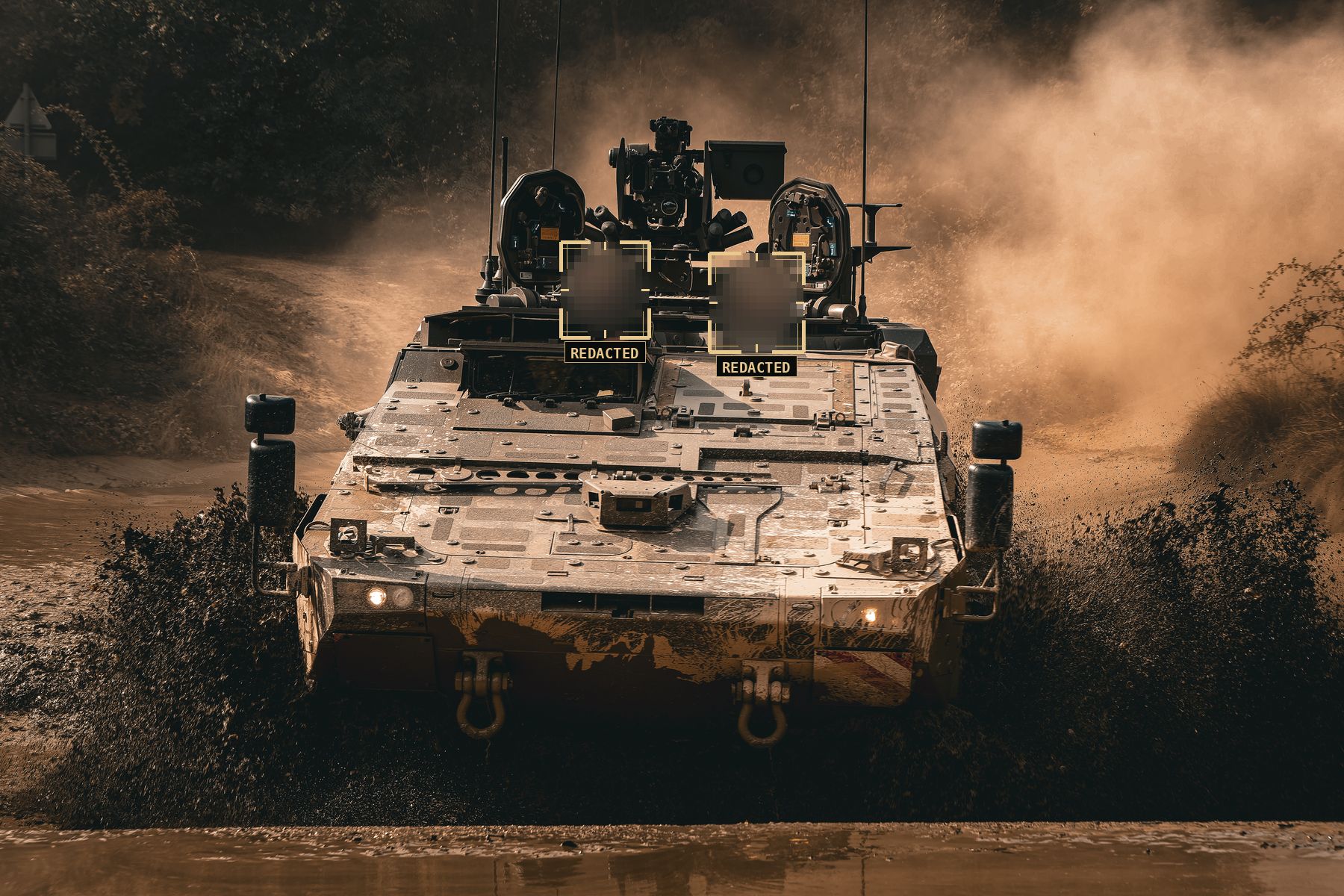 Boxer armoured vehicle powering through the water crossing at UTAC Millbrook, filmed by SkyGlide