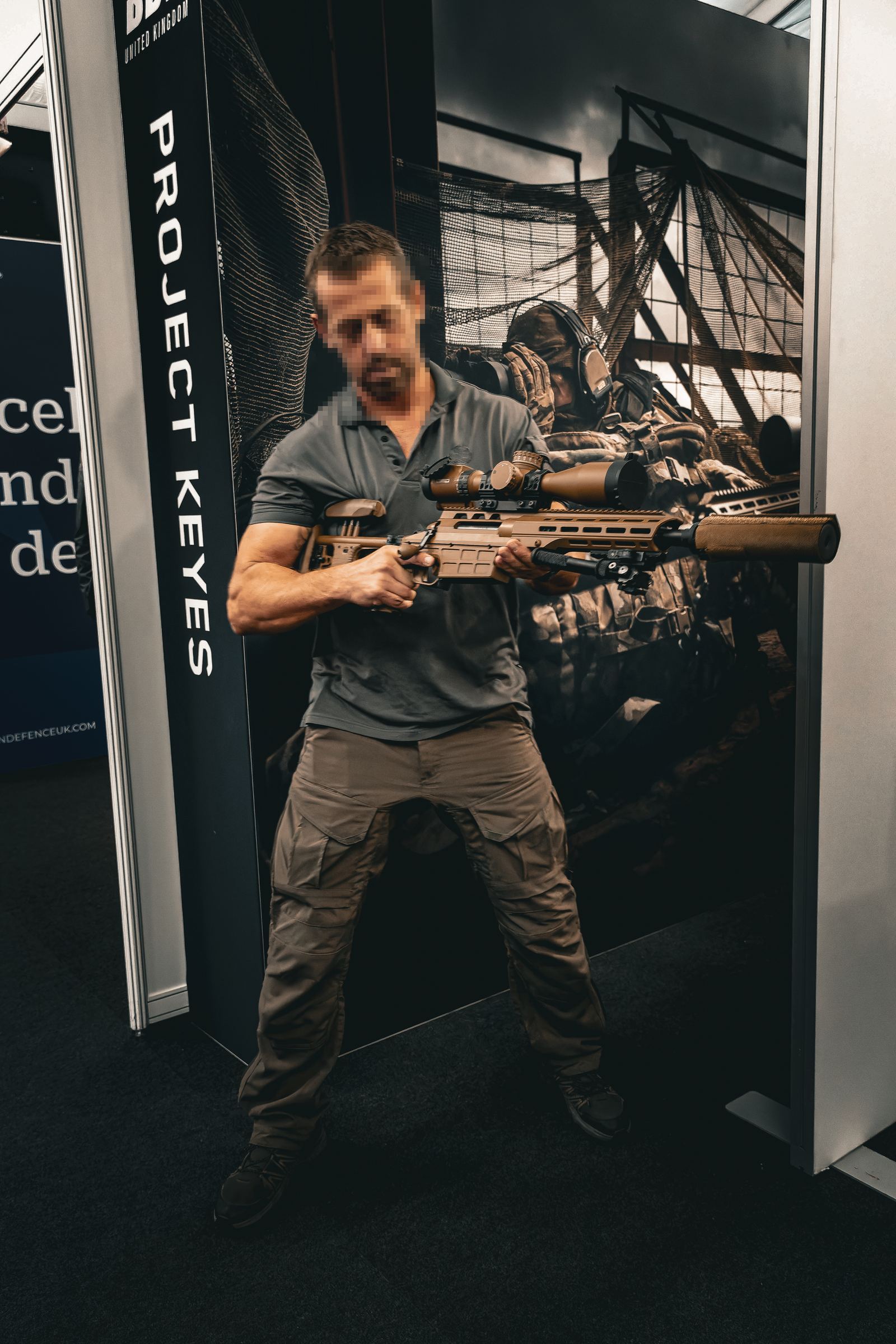Precision rifle being handled at an exhibition stand