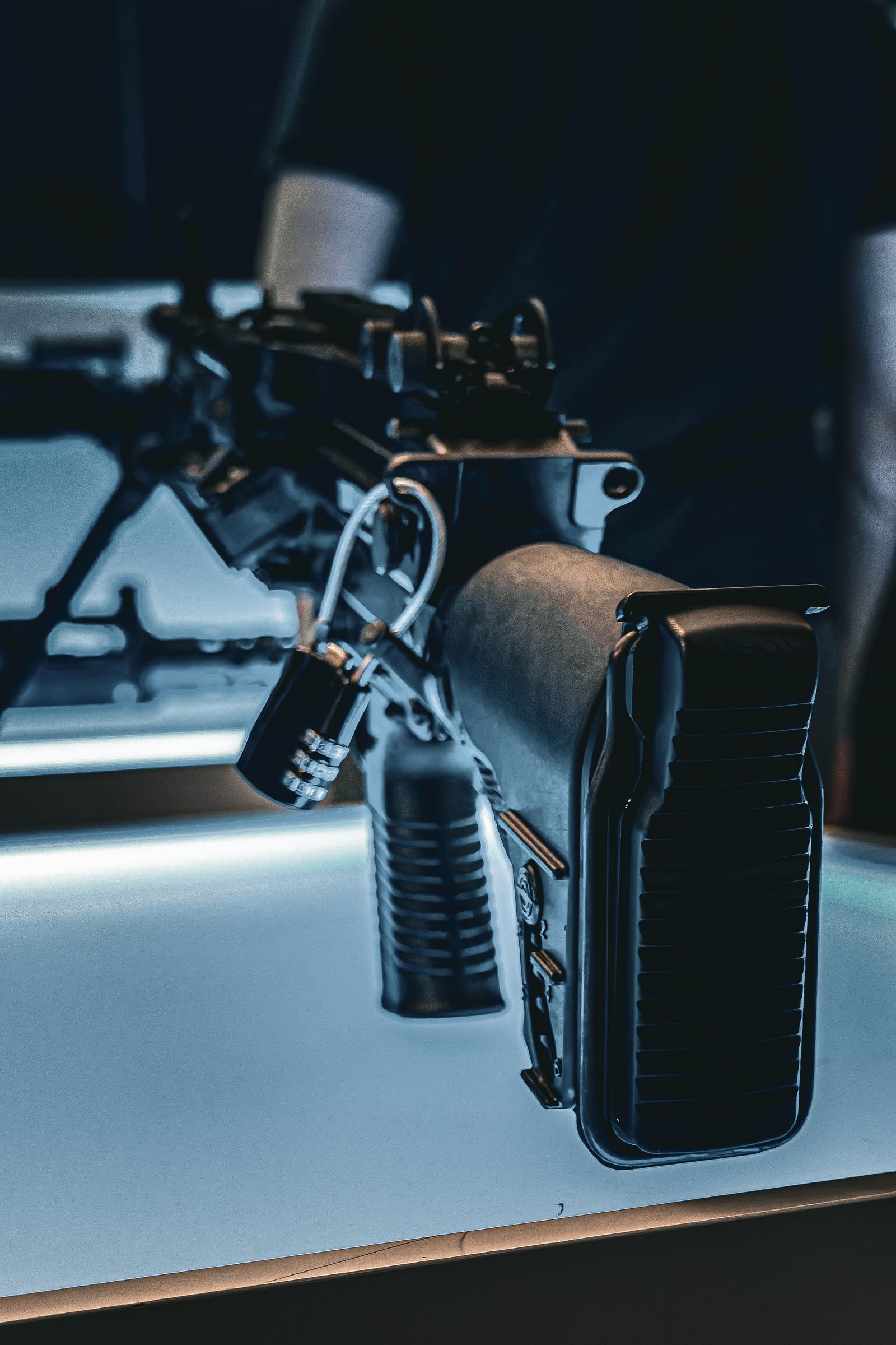 Weapon system on a display table at a defence exhibition
